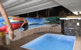 Casa com piscina praia grande Beach House